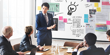 Rectangle 13481 Business strategy meeting with website design concepts and aesthetic clinic branding.